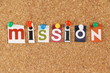 The word Mission in cut out magazine letters