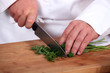 Photo: Chef chopping parsley Chef chopping parsley