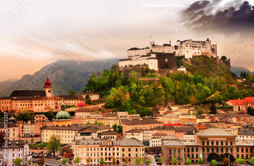Photo: Salzburg city on sunset with castle view, Austria Salzburg city on sunset with castle view, Austria