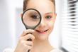 teenage girl with magnifying glass