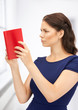 calm and serious woman with book