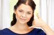 woman making a call me gesture