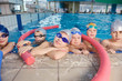 happy children group  at swimming pool