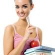 Photo: Young woman with notebooks, isolated Young woman with notebooks, isolated