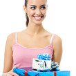 Foto: Young smiling woman with gift, isolated Young smiling woman with gift, isolated