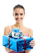 Foto: Young smiling woman with gift, isolated Young smiling woman with gift, isolated