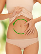 woman placing hand on her belly