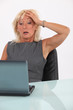 Shocked blond businesswoman