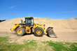 Photo : bulldozer working in sand dunes bulldozer working in sand dunes