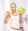 woman biting lettuce