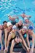 happy teen group  at swimming pool