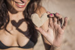 canvas print picture - Smiling Girl with Sand Heart