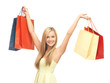 excited woman with shopping bags