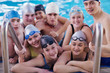 happy teen group  at swimming pool