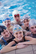 Foto: happy teen group at swimming pool happy teen group at swimming pool
