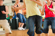 Photo: Zumba or Jazzdance - young people dancing in studio Zumba or Jazzdance - young people dancing in studio