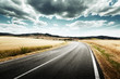 Tuscany road in sunny summer day