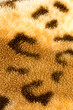 Photo: background from a fabric tiger skin background from a fabric tiger skin