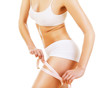 Foto: woman figure with white tapemeasure woman figure with white tapemeasure