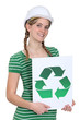 Woman holding a recycling label