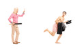 Full length portrait of a woman with baseball bat shouting at a