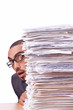 Busy businessman with lots of papers