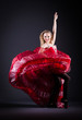 Girl in red dress dancing dance