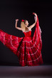 Girl in red dress dancing dance