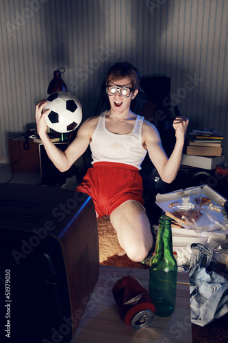 Photo: Soccer Fan Watching Television Soccer Fan Watching Television