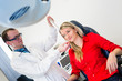 Optometry concept - pretty young woman having her eyes examined