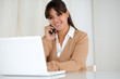 Smiling young woman browsing the internet