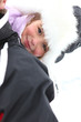 Photo: Man giving daughter piggy-back through the snow Man giving daughter piggy-back through the snow