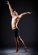 Dancer dancing in the dark studio