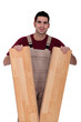 a carpenter showing floorboards