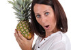 Woman holding pineapple