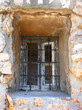 old window with iron grills