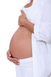 Photo: Woman hugging her pregnant belly Woman hugging her pregnant belly