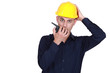 Foto: Confused architect holding radio Confused architect holding radio
