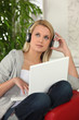 Photo: Blond teen wearing headphones Blond teen wearing headphones