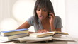 Black college student calling friend for help