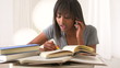 Black college student calling friend for help
