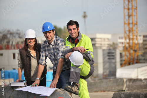 Photo: A team of construction workers A team of construction workers