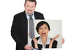 Photo: Businessman with a picture of a woman shouting Businessman with a picture of a woman shouting