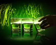 Three glasses of green absinth