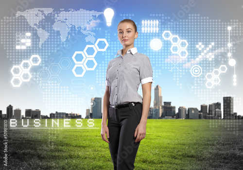 Photo: Business person with digital symbols Business person with digital symbols