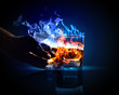 Two glasses of burning absinthe