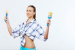 Photo: Woman with paint brushes Woman with paint brushes