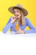 Photo: Woman drinking orange juice Woman drinking orange juice