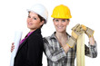 Photo: female architect stood with female carpenter female architect stood with female carpenter