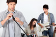 Three musicians rehearsing